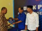 perwakilan-ahsan-jafar-saat-ambil-formulir-di-sektetariat-dpd-nasdem-barru1.jpg