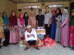 perwakilan-alumni-smp-palanro-menyerahkan-sumbangan.jpg