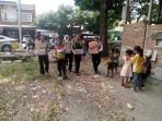 polsek-ujung-bulu-menyerahkan-bantuan.jpg