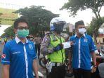 possi-sulsel-membagikan-masker.jpg