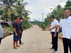 ptpn-iv-memberikan-bantuan-pembangunan-jalan.jpg