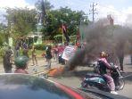 puluhan-mahasiswa-menggelar-aksi-unjuk-rasa.jpg