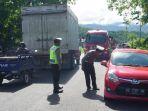 razia-penyekatan-larangan-mudik-di-perbatasan-sulbar-sulsel.jpg