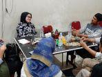 salah-satu-staf-humas-kpk-ipi-maryati-1.jpg