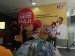 sales-area-manager-indosat-makassar-rosna-r-menjelaskan-paket-roam-unlimited-haji.jpg