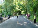 satlantas-polres-enrekang-melaksanakan-operasi-rutin-di-jalan-poros-enrekang-toraja.jpg