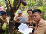 sejumlah-siswa-jurusan-otomotif-smk-1-luwu-utara-mengikuti-pelatihan-budidaya-kakao_20180928_171611.jpg