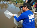 sekkab-luwu-utara-melepas-ikan-di-sungai-batang-tongka_20180919_161348.jpg