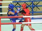 sri-eviayanti-merah-saat-berlaga-di-babak-semifinal-kelas-45-kg.jpg