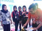suasana-penyaluran-donasi-alfamidi-bersama-lazismu.jpg