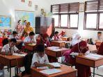 suasana-ujian-nasional-un-sekolah-dasar-sd-1-mamuju-sulawesi-barat.jpg