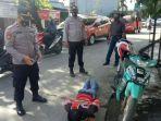 suasana-warga-tak-pakai-masker-diberi-sanksi-sosial-di-jl-hos-cokroaminoto-dan-wahid-hasyim.jpg