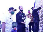 syl-melakukan-kunjungan-kerja-di-provinsi-sulawesi-utara-melepas-ekspor-komoditas-pertanian-2.jpg