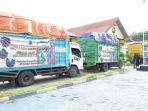tiga-truk-bantuan-korban-gempa-sulbar-dari-polda-papua-barat-saat-tiba-di-polres-majene.jpg
