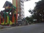 tugu-yang-menjadi-simbol-batas-antara-kabupaten-luwu-utara.jpg