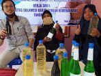 universitas-sulawesi-barat-unsulbar-melatih-kelompok-usaha-pembuatan-minyak-kelapa-marasa.jpg
