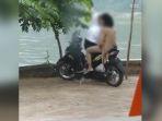 viral-pasangan-sejoli-bercumbu-di-atas-motor-metik-di-telaga-netizen-butuh-sekolah-tatap-muka.jpg