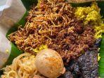warung-nasi-kuning-riburane-warung-asuhan-hj-istiah-ini-berlokasi-di-jalan-riburane-nomor-13.jpg