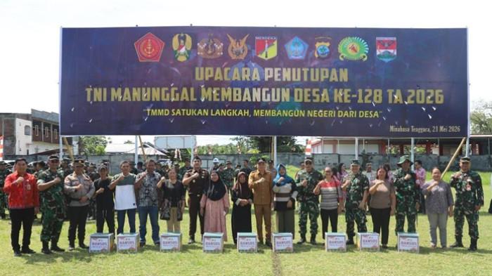 Bupati Ronald Kandoli saat menghadiri upacara penutupan TMMD