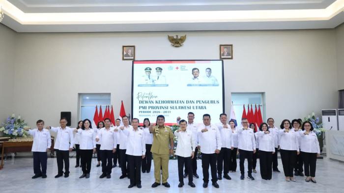 HADIR - Bupati dan wakil Bupati Bolmong saat menghadiri pelantikan PMI Sulut Periode 2026-2031 di Manado Senin (15/06/2026).