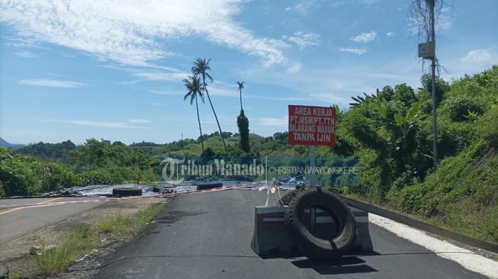 RUSAK- Jalan Nasional di ruas Likupang - Girian, Bitung, Sulawesi Utara yang rusak dan putus tak bisa digunakan. Jalan baru akan dibuka sembari menunggu proses perbaikan jalan rusak.
