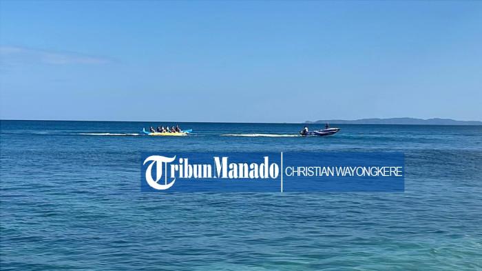 PANTAI PAAL - Suasana Pantai Paal di Desa Marinsow Kecamatan Likupang Timur Kabupaten Minahasa Utara saat tanggal merah atau libur Nasional. Pantau Paal nampak kurang pengunjung.