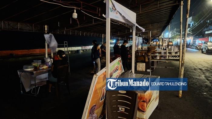 MATI LAMPU - Sejumlah penjual yang beraktivitas di lokasi Festival Seni Budaya Tahuna, Kabupaten Kepulauan Sangihe, Sulut pada Sabtu (8/11/2025). Pemadaman listrik ganggu aktivitas penjual di Festival Seni Budaya Tahuna, Sangihe, Sulut.