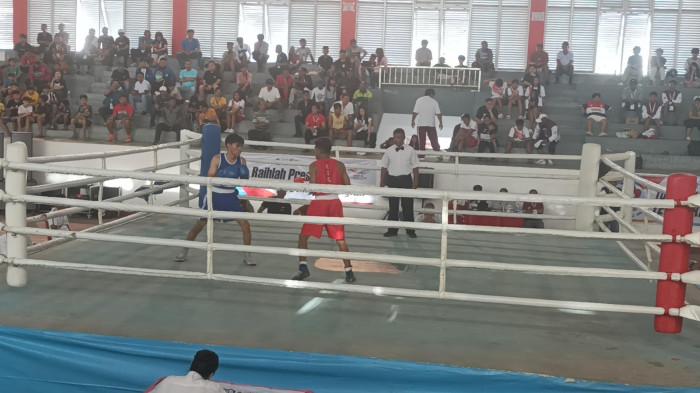 TINJU - Cabang olahraga Tinju akan menggelar babak final pada Minggu (23/11/2025) sore di Hall Pertina di Kelurahan Sario Utara, Kecamatan Sario, kota Manado, provinsi Sulawesi Utara. 