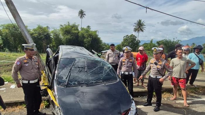 KECELAKAAN MAUT: TKP kecelakaan di Jalan Trans Kotobangon-Moyag, Kotamobagu, Sulut, pada Kamis (13/11/2025), sekira pukul 07.30 WITA. Istri anggota TNI jadi korban meninggal.