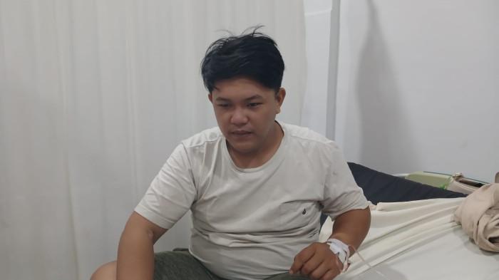 KORBAN SELAMAT - Korban selamat kecelakaan jet ski di Teluk Manado, Jonathan Rantelengan. Ia dirawat di RS Advent Kota Manado, Sulawesi Utara.