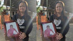 Istri-Almarhum-Roy-Manampiring-memperlihatkan-foto-suaminya.jpg
