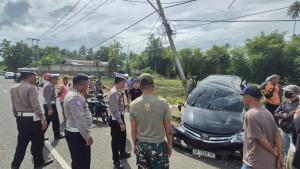 KECELAKAAN-DI-KOTAMOBAGU-Identitas-pengemudi-mobil-minibus-hitam-yang-menabrak-istri-anggota-TNI.jpg