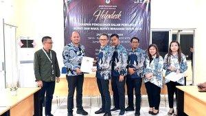 KPU-Kabupaten-Minahasa-menetapkan-tiga-pasangan-calon-sebagai-peserta-pemilihan-Bupati.jpg