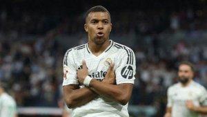 Kylian-Mbappe-usai-mencetak-gol-untuk-Real-Madrid.jpg