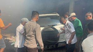 Mobil-mini-bus-mereka-Daihatsu-Terrios-warna-putih-dengan-nomor-polisi-DB-1320-CD.jpg