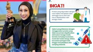 Potret-dr-Reza-Gladys-saat-meraih-penghargaa.jpg
