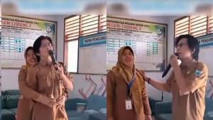 Viral-di-media-sosial-dua-orang-guru-di-SDN-Pandeglang-viral-asik-karaoke.jpg