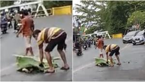Warga-menutupi-jasad-korban-kecelakaan-lalu-lintas-di-jalan-nasional-dengan-daun-pisang.jpg