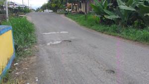 jalan-Garuda-di-Kelurahan-Motoboi-Kecil-Kotamobagu-rusak.jpg