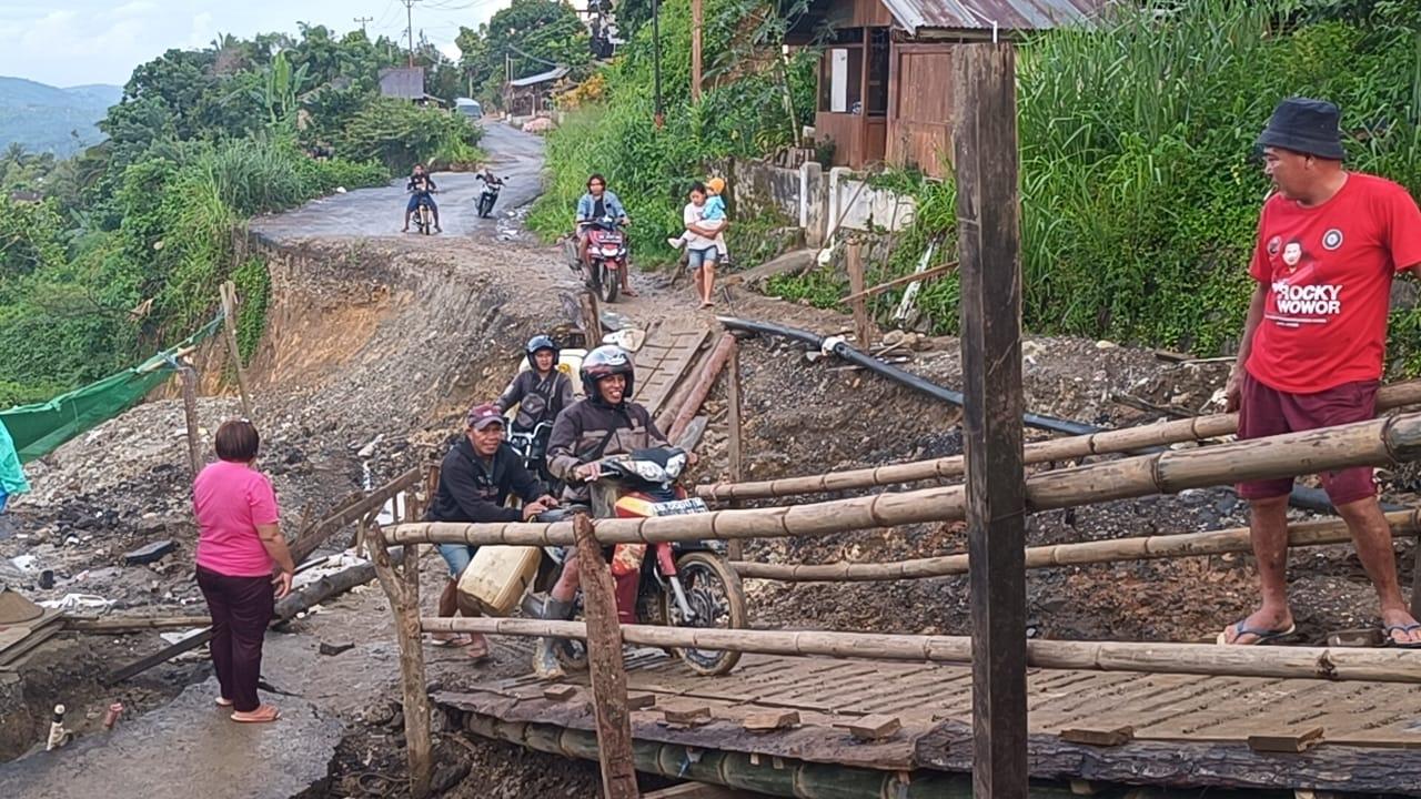 Akses-jalan-yang-putus-di-Desa-Lanud-Kecamatan-Modayag900.jpg