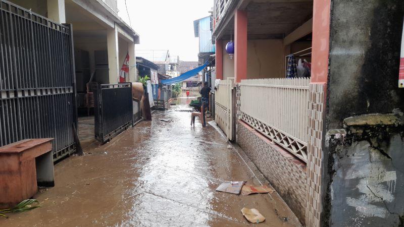 Banjir-dengan-dahsyat-menghantam-wilayah-Kelurahan-Paal-Dua-Lingkungan.jpg