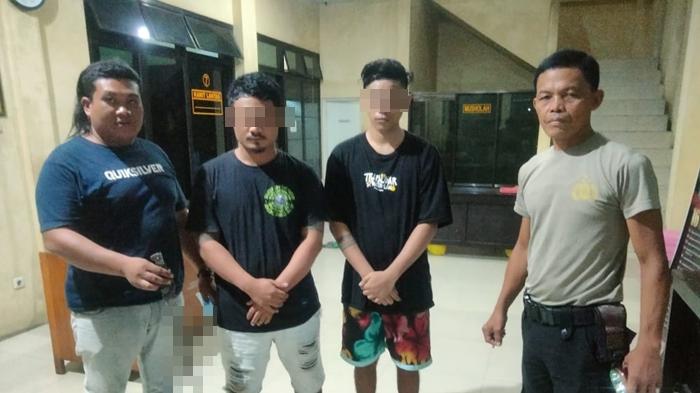 Dua-tersangka-penganiayaan-ditangkap-Polres-Kota-Bitung.jpg