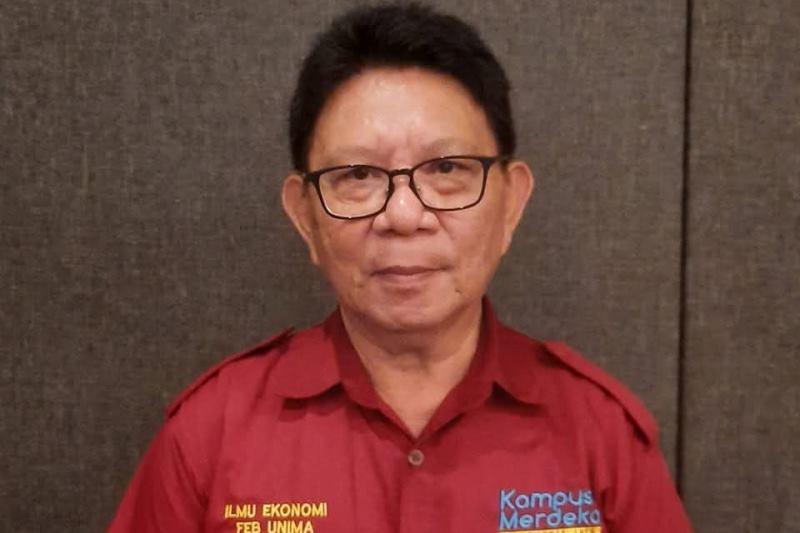 EKONOM-SULUT-Ekonom-Universitas-Negeri-Manado-Dr-Robert-Winerungan.jpg