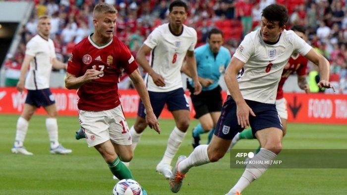 Gelandang-Hungaria-Andras-Schafer-kiri-dan-bek-Inggris-Harry-Maguire.jpg
