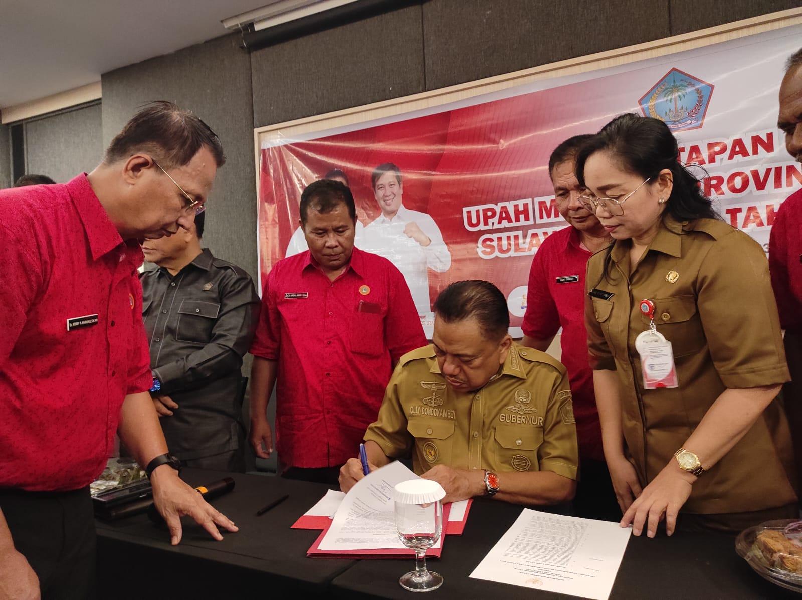 Gubernur-Sulawesi-Utara-Olly-Dondokambey-menandatangi-Shgjmghjh.jpg