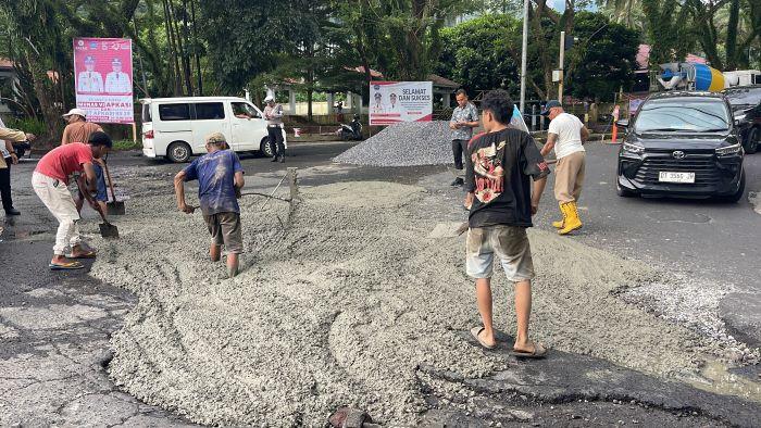 Sering Dikeluhkan Warga, Pemkab Minut Pilih Cor Trimix Jalan Provinsi yang Rusak Parah di Zero Poin