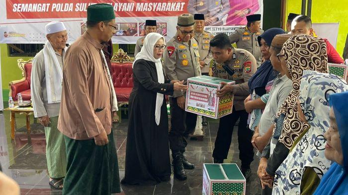 Kapolda-Sulut-Irjen-Pol-Setyo-Budiyanto-menyerahkan-bantuan-sosial.jpg