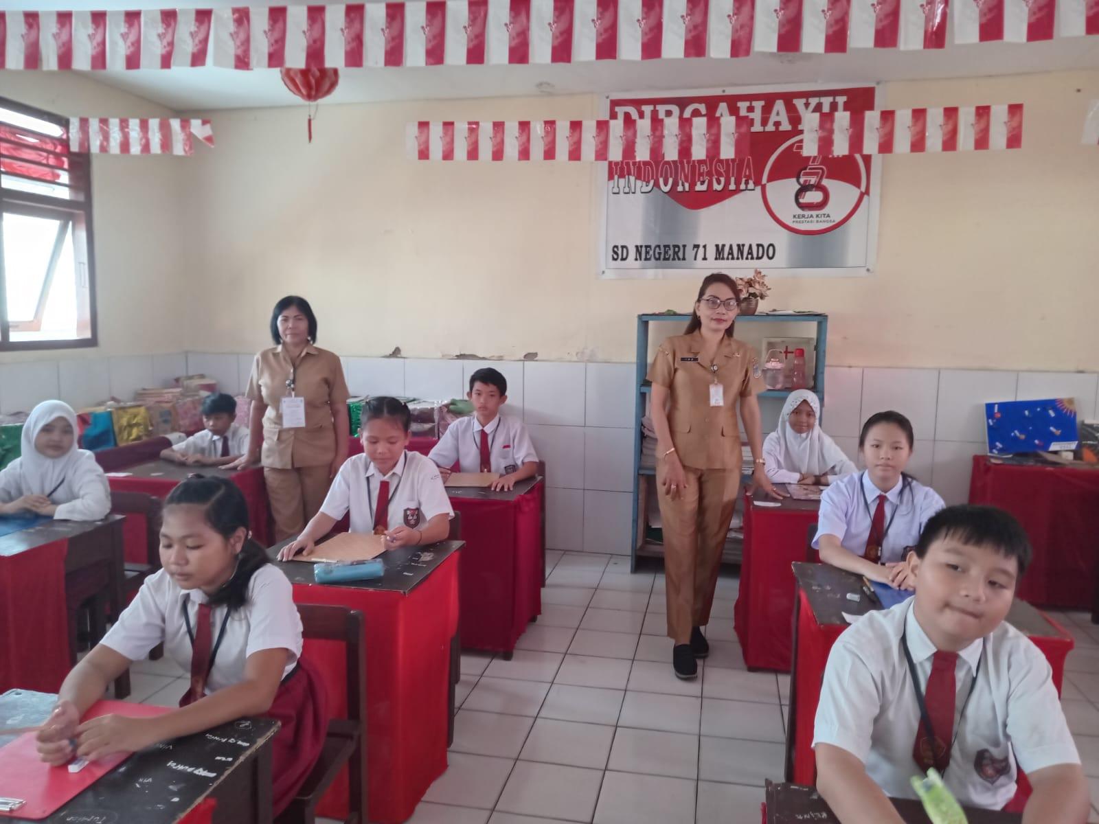 Kepsek-Guru-dan-siswa-di-Sekolah-SD-Negeri-71-Manado-Sulawesi-Utara.jpg