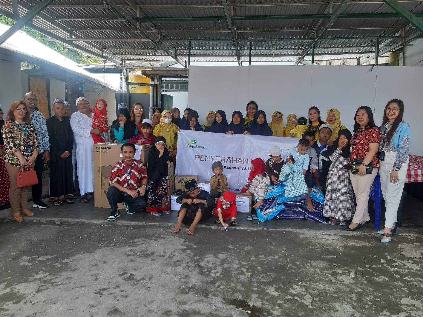 Mengetuk Pintu Langit, Pegadaian Area Manado 1 dan IIKP Berbagi Kasih dengan Yatim Piatu