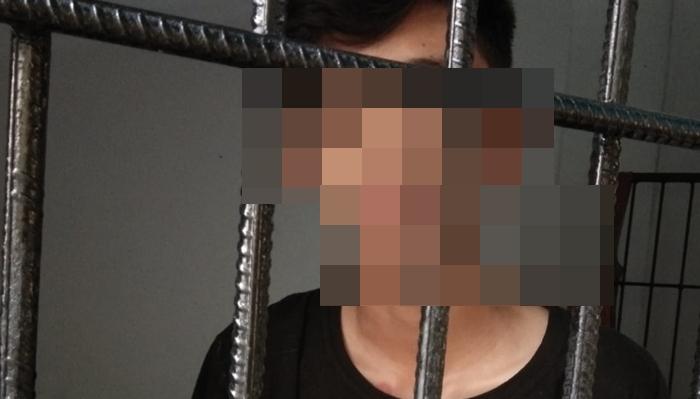 Pelaku-saat-diamankan-di-Mapolresta-Manadofhdfhdfhhf.jpg